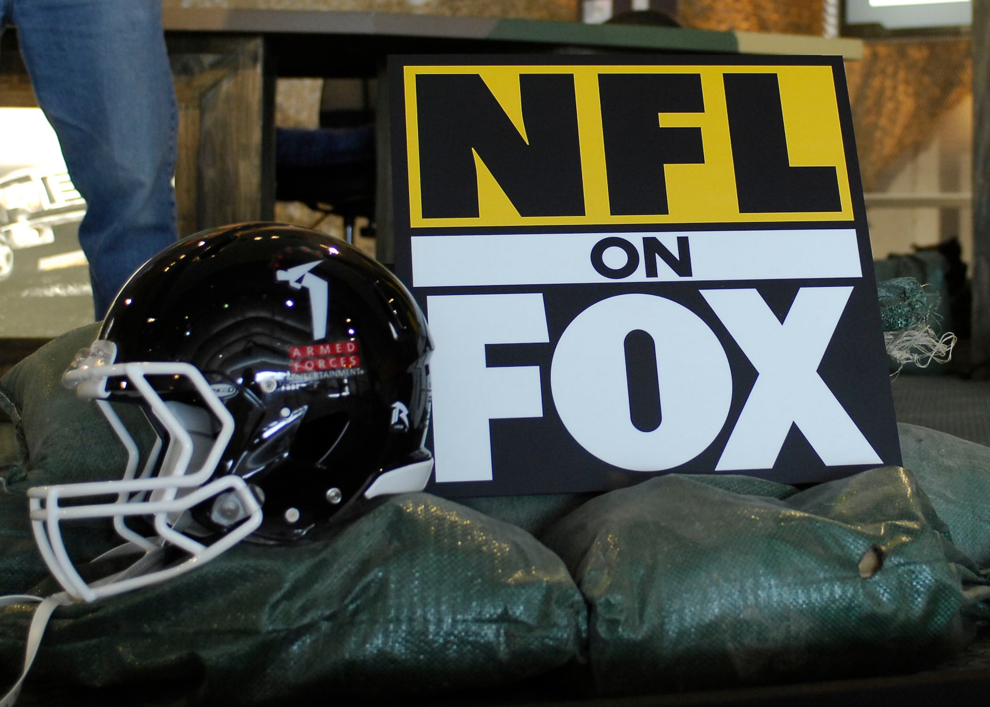 BAGRAM AIR FIELD, Afghanistan -- The Fox Sports members transformed the MWR clamshell into a set for the "Fox NFL Sunday" team.  Bagram welcomed Jay Glazer, Howie Long, Terry Bradshaw, Michael Strahan, Jimmy Johnson, and Curt Menefee.  The "Fox NFL Sunday" team is scheduled to broadcast live Nov. 8, 2009 from here.  (U.S. Air Force photo/Senior Airman Felicia Juenke)