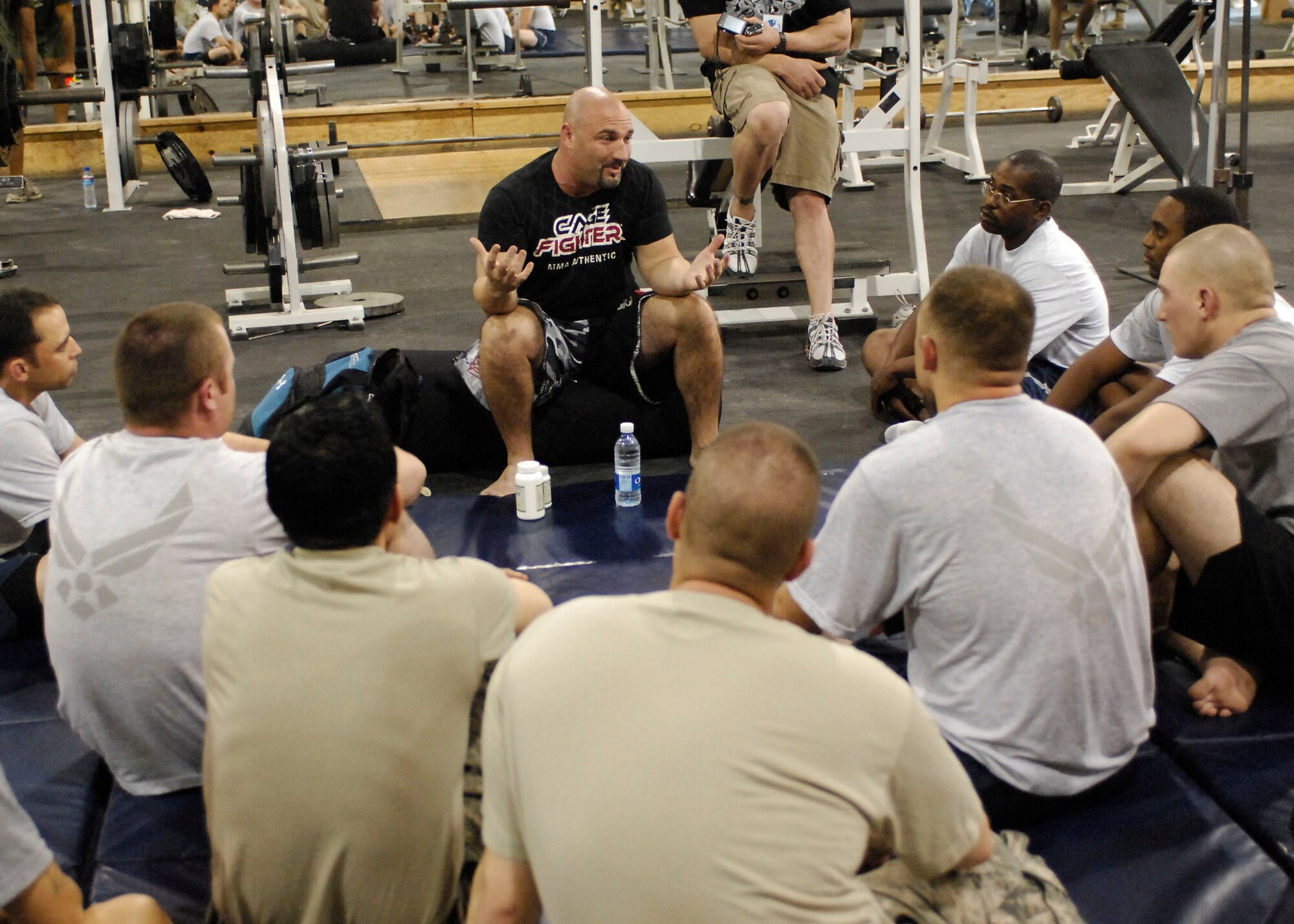 BAGRAM AIR FIELD, Afghanistan -- Jay Glazer, senior NFL writer for Fox Sports, gives a safety briefing before beginning a mixed martial arts class Nov. 6, 2009.  Mr. Glazer along with Howie Long, Terry Bradshaw, Michael Strahan, Jimmy Johnson, and Curt Menefee are visiting troops deployed to Bagram to thank them for their role in Operation Enduring Freedom.  The "Fox NFL Sunday" team is scheduled to broadcast live Nov. 8 from here.  (U.S. Air Force photo/Senior Airman Felicia Juenke)