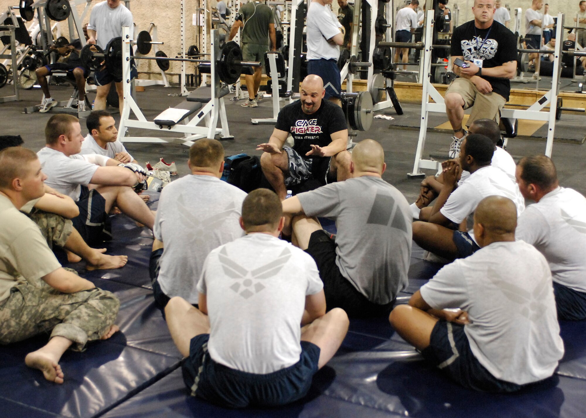 BAGRAM AIR FIELD, Afghanistan -- Jay Glazer, senior NFL writer for Fox Sports, teaches a two hour mixed martial arts class while visiting Bagram Nov. 6, 2009.  Mr. Glazer along with Howie Long, Terry Bradshaw, Michael Strahan, Jimmy Johnson, and Curt Menefee are visiting troops to thank them for their role in Operation Enduring Freedom.  The "Fox NFL Sunday" team is scheduled to broadcast live Nov. 8 from here.  (U.S. Air Force photo/Senior Airman Felicia Juenke)