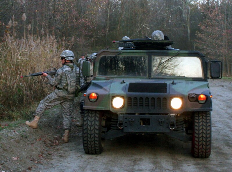 Students in the Combat Airman Skills Training Course participate in a scenario in mounted patrol tactics on a range on Joint Base McGuire-Dix-Lakehurst, N.J., on Nov. 8, 2009.  The course, taught by the U.S. Air Force Expeditionary Center's 421st Combat Training Squadron, prepares Airmen for upcoming deployments.  (U.S. Air Force Photo/Tech. Sgt. Scott T. Sturkol)