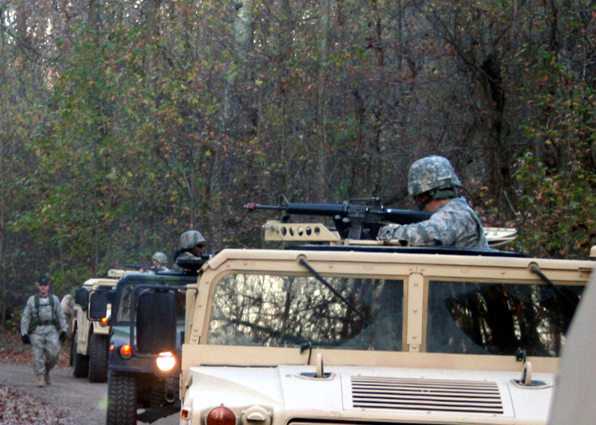 Students in the Combat Airman Skills Training Course participate in a scenario in mounted patrol tactics on a range on Joint Base McGuire-Dix-Lakehurst, N.J., on Nov. 8, 2009.  The course, taught by the U.S. Air Force Expeditionary Center's 421st Combat Training Squadron, prepares Airmen for upcoming deployments.  (U.S. Air Force Photo/Tech. Sgt. Scott T. Sturkol)
