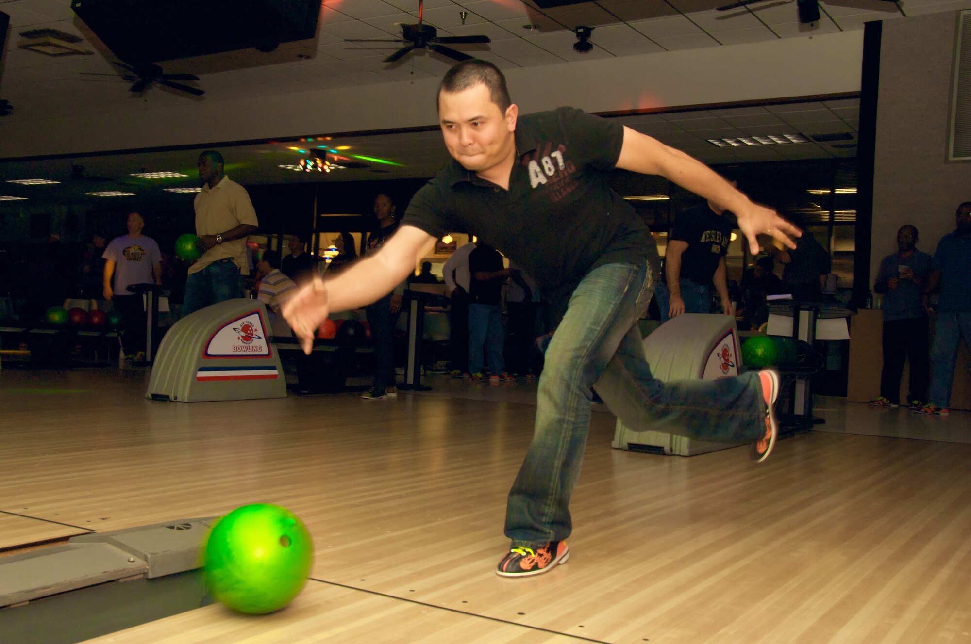 KEESLER AIR FORCE BASE, Miss. -- The 403rd Wing Bowlapalooza struck the Mississippi Gulf Coast during the November Unit Training Assembly. Staff Sgt. John Riedel, 403rd Communications Flight client support administrator, bowled the night away along with more than 100 other wings members here at Gaude Lanes. This was the third Bowlapalooza held by the wing since its inception in 2007. The next Bowlapalooza is scheduled for the February 2010 UTA. (U.S. Air Force photo by Tech. Sgt. Ryan Labadens)