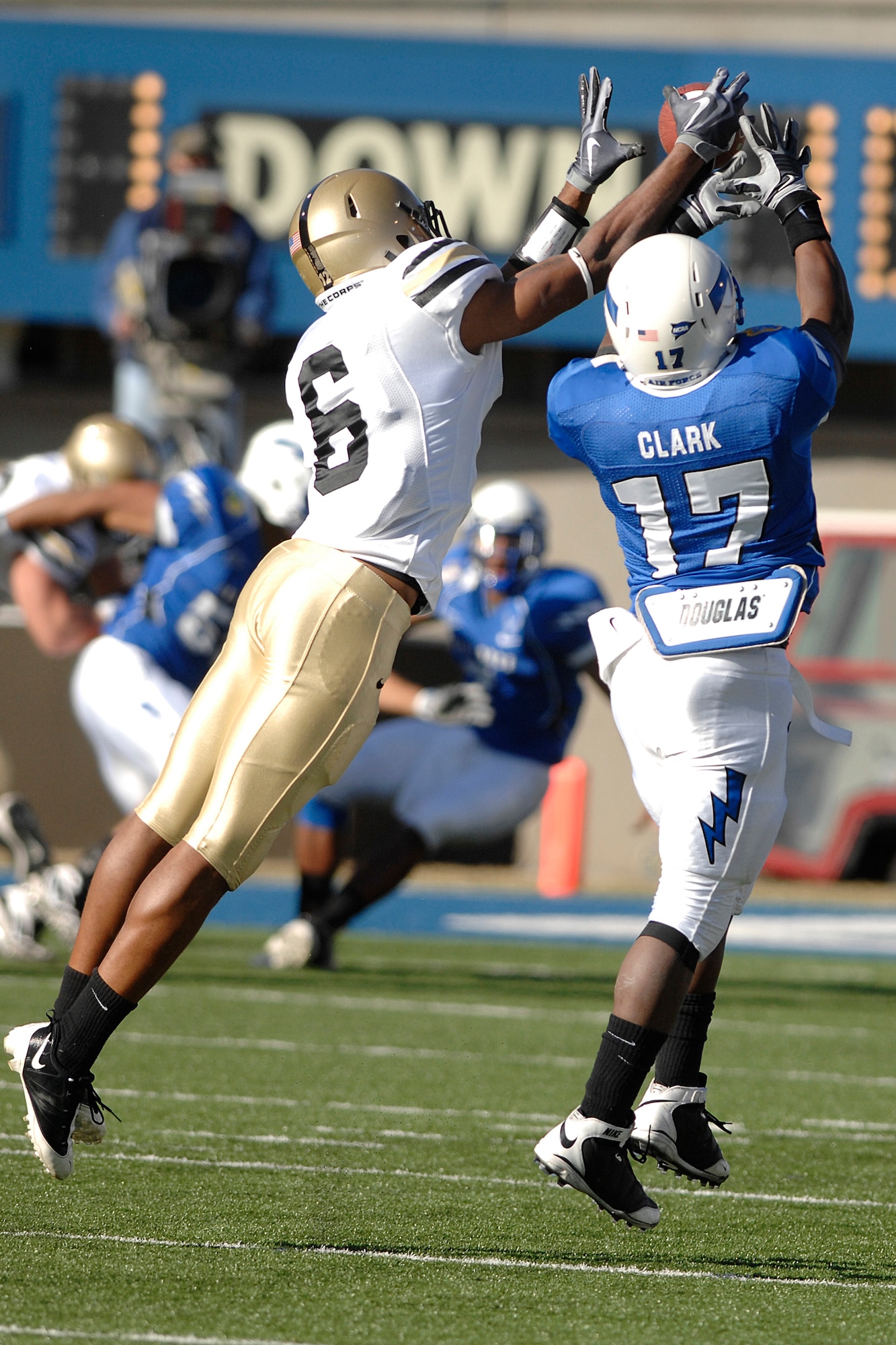 Army defensive back Donovan Travis breaks up a pass intended for Falcons running back Asher Clark during the Air Force-Army game at Falcon Stadium Nov. 7, 2009. Clark had 82 rushing yards on 13 carries in Air Force's 35-7 victory. (U.S. Air Force photo/Mike Kaplan)