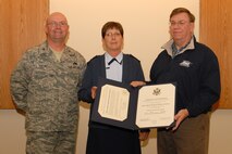 174th Fighter Wing Support Group Commander Col. Harvey M. Van Wie Jr., presides over Senior Master Sgt. Rosemarie Murray’s retirement ceremony on 8 Nov 2009.  Senior Master Sgt. Rosemarie Murray retires with more than 23 years of service proudly serving with the 174FW. Also pictured is Lt. Col. (Ret.) Robert Hillick former 174FW Military Personnel Flight Commander. (RELEASED)