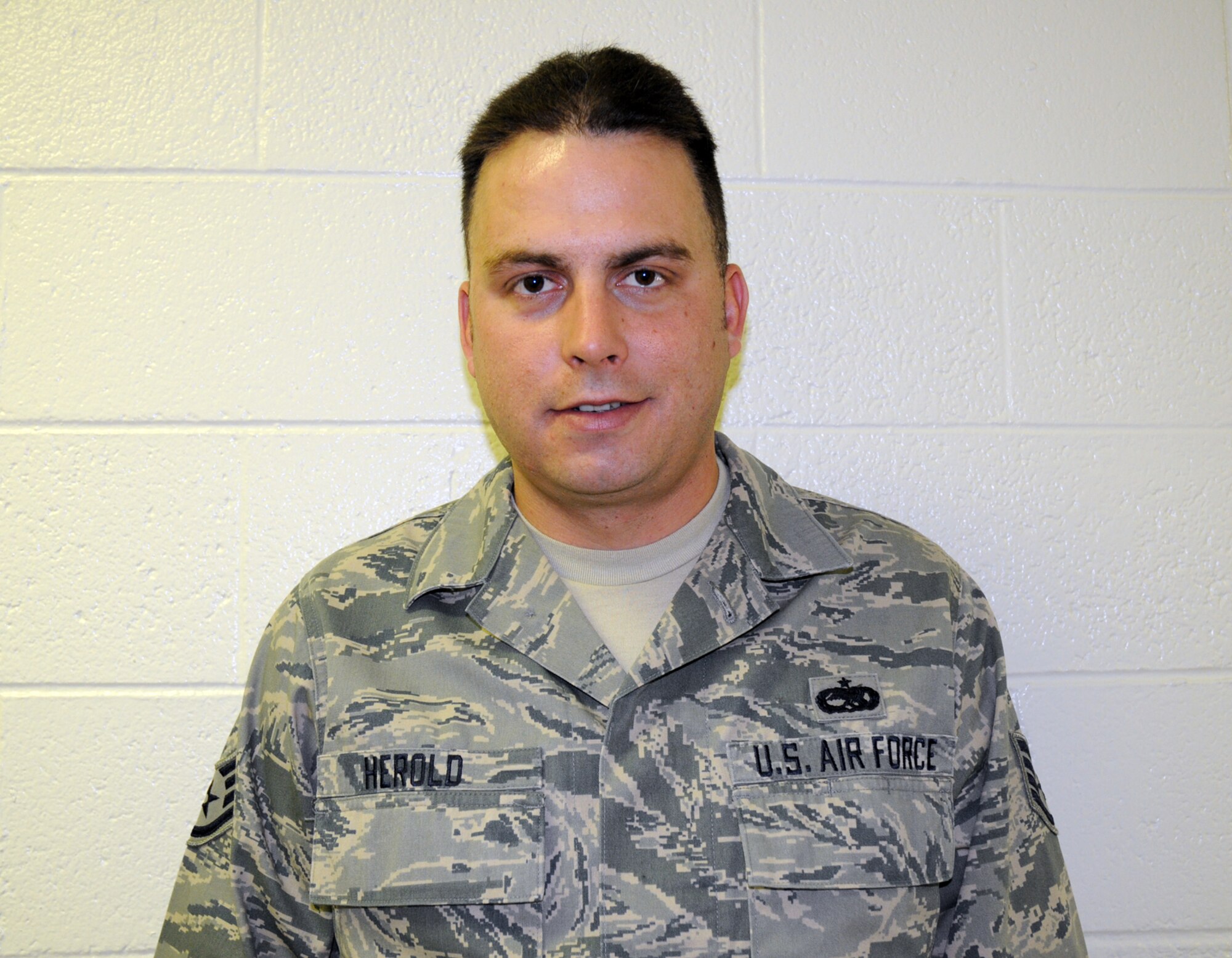 Staff Sgt. Dustin Herold recently joined the 512th Airlift Control Flight here. After serving in the regular Air Force as a rocket propulsion specialist at the Air Force Academy, Sergeant Herold said he looks forward to the military camaraderie while working with the 512th ALCF. In his spare time, Sergeant Herold enjoys fishing, archery and sculptural art. (U.S. Air Force photo/Staff Sgt. Steve Lewis)