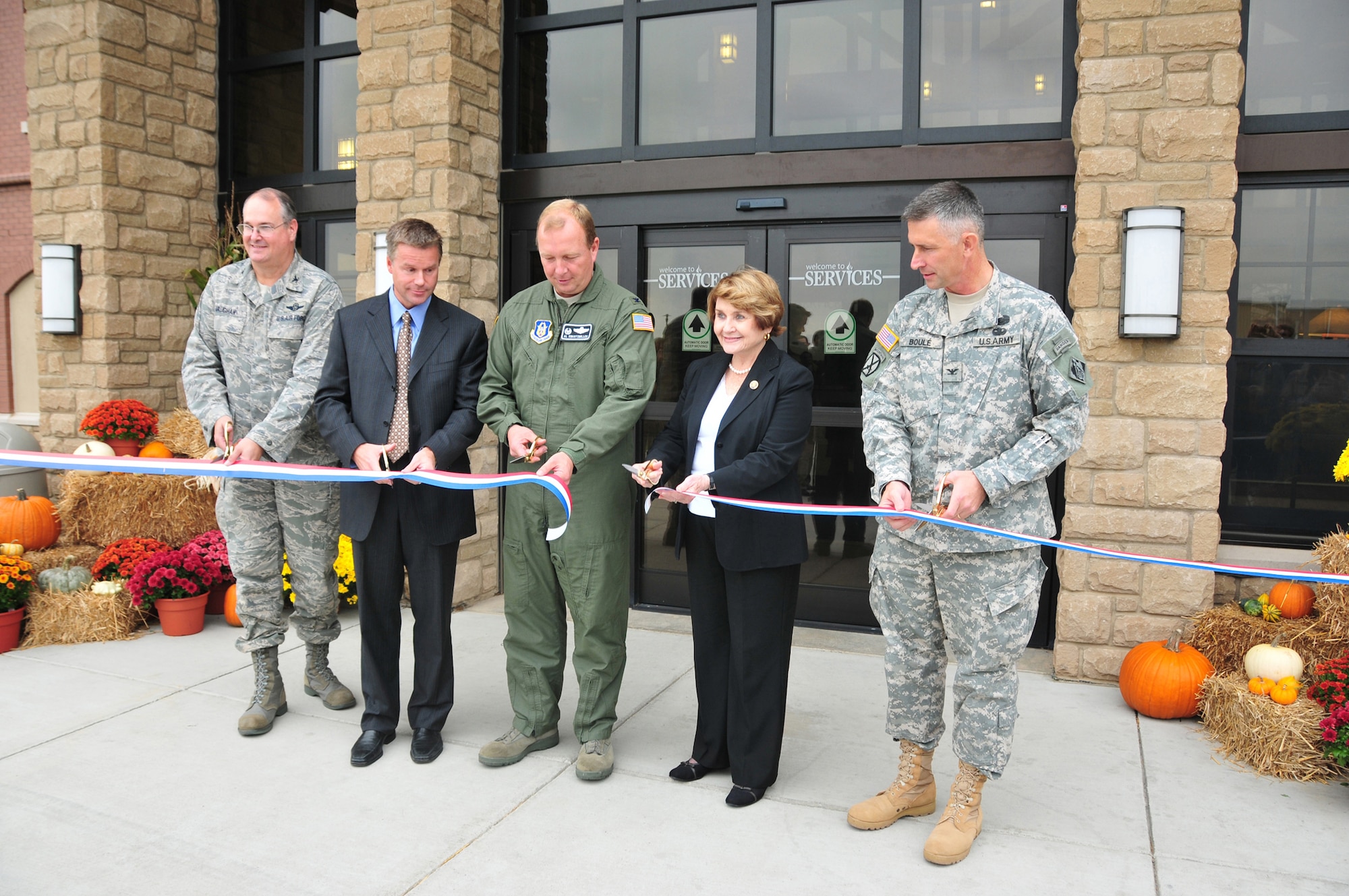 NIAGARA FALLS AIR RESERVE STATION, N.Y. - The Niagara Falls ARS officially opened a new $16 million Airman's lodging facility here October 9, 2009.  Pictured cutting the ceremonial ribbon are (left to right) Col. Timothy Vaughan, 107th Mission Support Group commander; Congressman Christopher Lee, NY 26th District; Col. Allan Swartzmiller, 914th Airlift Wing and installation commander; Congresswoman Louise Slaughter, NY 28th District; Col. John Boulé, Commander of U.S. Army Corp of Engineers NY District. (U.S. Air Force photo by Staff Sgt. Joseph McKee)