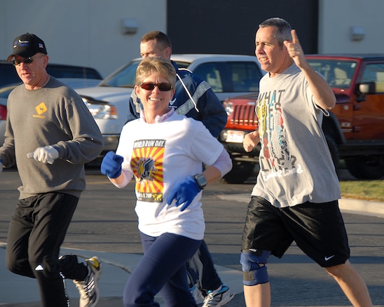 Members of the Utah Air National Guard run to earn money for the Fischer House foundation on November 8.  The chiefs on base sponsored the run and others participated to support the donations given to the charity fundraiser.  U.S. Air Force Photo by: Staff Sgt. Emily Monson (RELEASED)