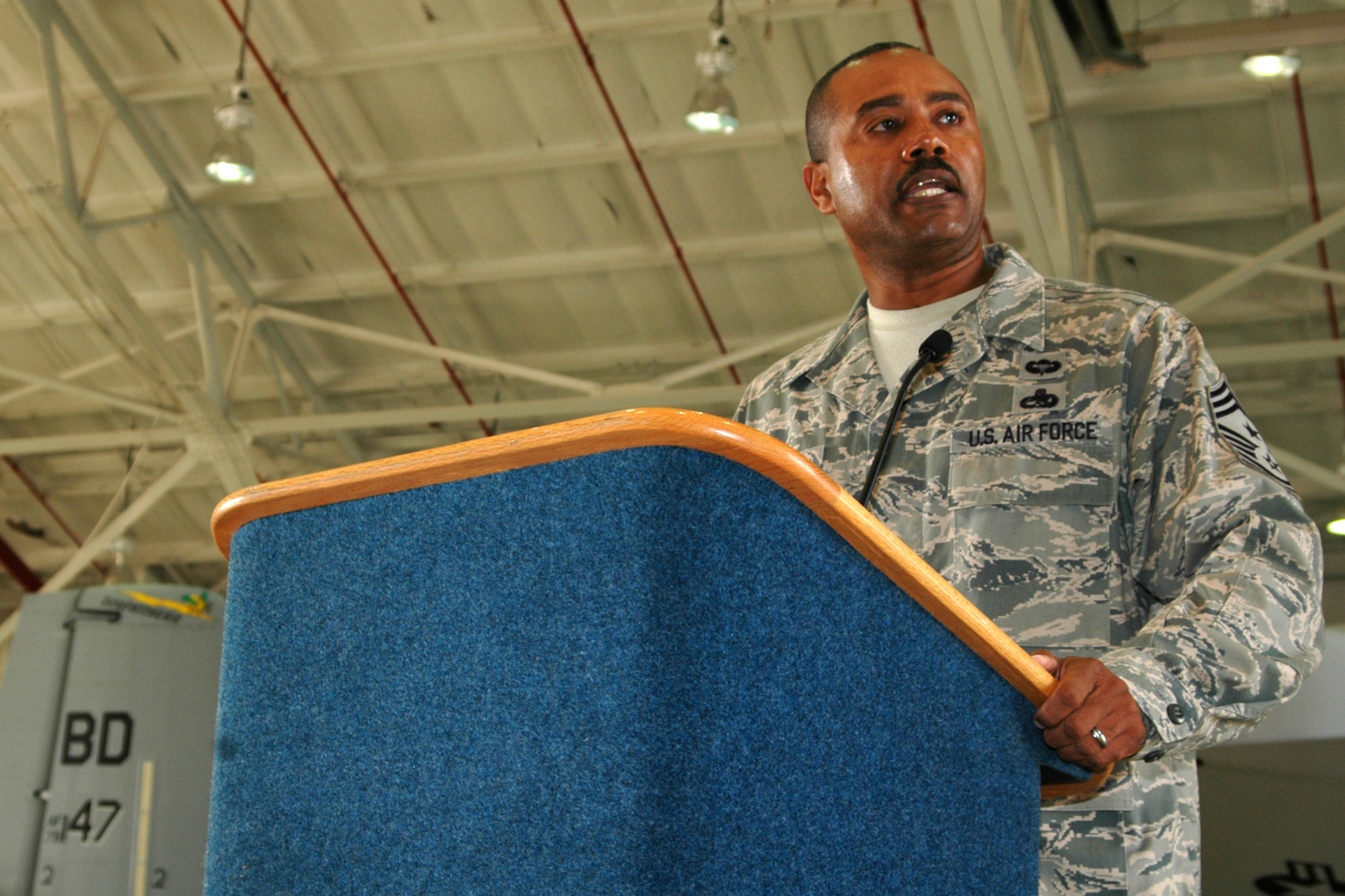 Chief Master Sgt. Lesley Morrissette, command chief, 10th Air Force, speaks at the 917th Maintenance Group Non-commissioned Officer Induction ceremony November 7, 2009. Chief Morrissette participated in the induction ceremony, which was held in the A-10 Hangar at Barksdale Air Force Base, La., and congratulated the 21 staff sergeants on their promotions. (U.S. Air Force photo/Senior Airman Crystal Jordan)