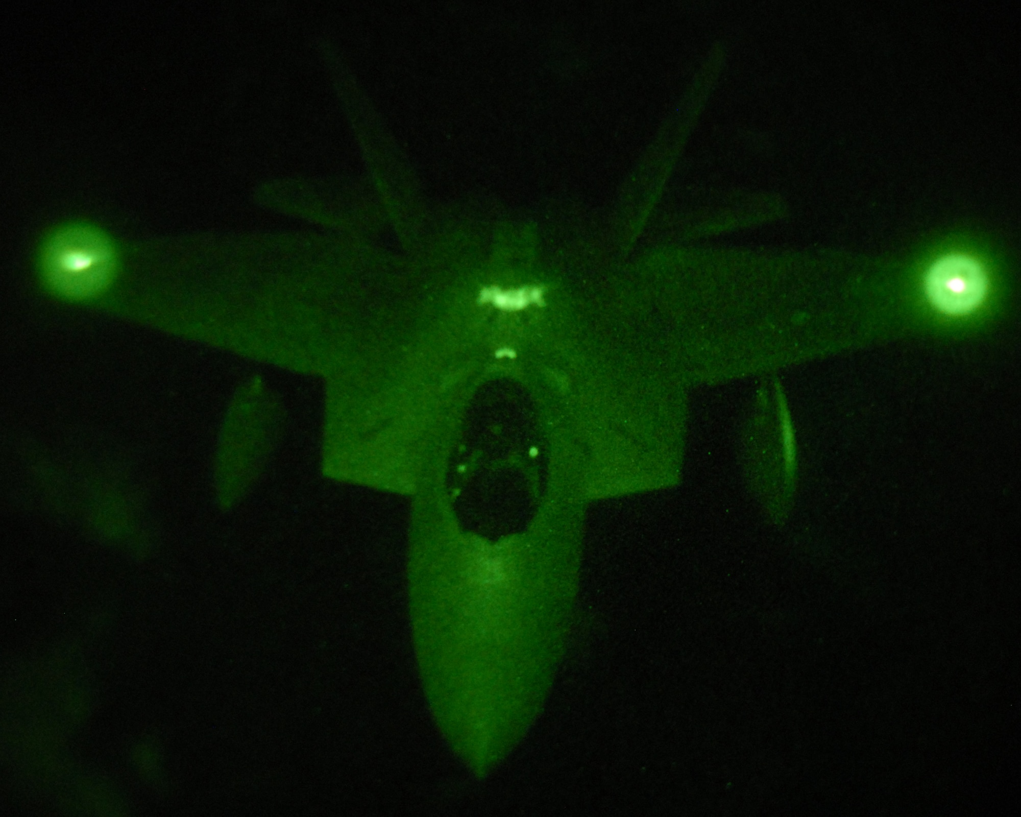While en-route to Exercise Coronet Arrow at Al Dafra Air Base, United Arab Emirates, a United States Air Force pilot from the 1st Fighter Wing, Langley Air Force Base, Virginia, maneuvers an F-22 Raptor over the Atlantic Ocean in preparation to receive approximately 8,000-9,000 pounds of fuel from a New Hampshire Air National Guard KC-135R Stratotanker, November 7, 2009. Six 1st FW F-22A Raptors are participating in bilateral training with Coalition partners from Nov. 15 to Dec. 10 This marks the first eastbound deployment of the F-22 Raptors to the Central Command Area of Responsibility. The tanker and its crew are from the 157th Air Refueling Wing, Pease Air National Guard Base.  (U.S. Air Force photo/Staff Sgt. Curtis J. Lenz)