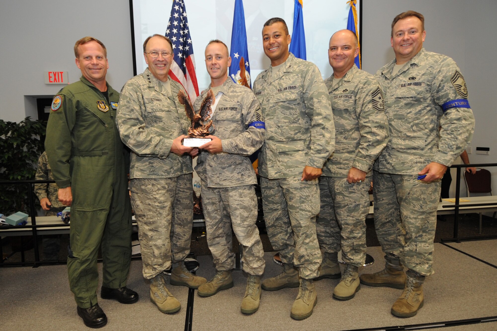 (From left to right) Lt. Col. Christian Fellhoelter, 944th Fighter Wing
chief of safety; Lt. Gen. Charles Stenner, Air Force Reserve Command
commander; Master Sgt. Anthony Krystoff, Air Force Reserve recruiter; Col.
Joe Wilburn, Air Force Reserve Command Recruiting Service commander, Chief
Master Sgt. Dwight Badgett, Air Force Reserve Command Command Chief; and Chief Master Sgt. Robert Starkey, AFRC Recruiting Service manager, pose for a photo after Sergeant Krystoff received an award for being the top in service recruiter for fiscal
year 2009. Sergeant Krystoff went well over his goal at 180 percent.
(Courtesy photo)
