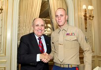 NEW YORK -- Marines from Special Purpose Marine Air Ground Task Force 26 pose with Rudy Giuliani, former New York City mayor and presidential candidate, during a Nov. 8 brunch at the Jumeriah Essex House in honor of the USS New York sailors and Special Purpose Marine Air Ground Task Force 26 Marines who embarked on the ship for her commissioning ceremony Nov. 11.