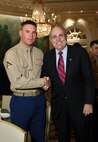 NEW YORK -- Marines from Special Purpose Marine Air Ground Task Force 26 pose with Rudy Giuliani, former New York City mayor and presidential candidate, during a Nov. 8 brunch at the Jumeriah Essex House in honor of the USS New York sailors and Special Purpose Marine Air Ground Task Force 26 Marines who embarked on the ship for her commissioning ceremony Nov. 11.