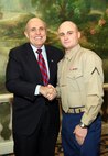 NEW YORK -- Marines from Special Purpose Marine Air Ground Task Force 26 pose with Rudy Giuliani, former New York City mayor and presidential candidate, during a Nov. 8 brunch at the Jumeriah Essex House in honor of the USS New York sailors and Special Purpose Marine Air Ground Task Force 26 Marines who embarked on the ship for her commissioning ceremony Nov. 11.
