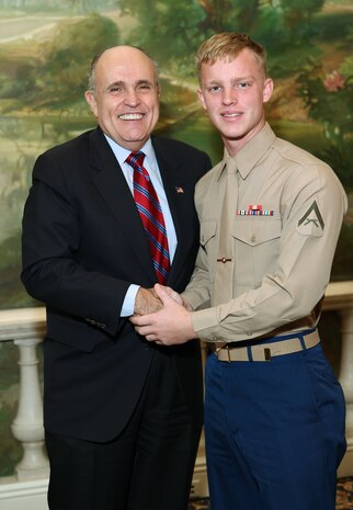 NEW YORK -- Marines from Special Purpose Marine Air Ground Task Force 26 pose with Rudy Giuliani, former New York City mayor and presidential candidate, during a Nov. 8 brunch at the Jumeriah Essex House in honor of the USS New York sailors and Special Purpose Marine Air Ground Task Force 26 Marines who embarked on the ship for her commissioning ceremony Nov. 11.