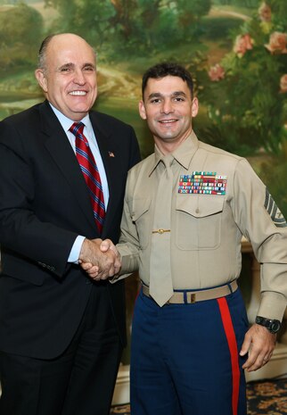 NEW YORK -- Marines from Special Purpose Marine Air Ground Task Force 26 pose with Rudy Giuliani, former New York City mayor and presidential candidate, during a Nov. 8 brunch at the Jumeriah Essex House in honor of the USS New York sailors and Special Purpose Marine Air Ground Task Force 26 Marines who embarked on the ship for her commissioning ceremony Nov. 11.