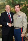 NEW YORK -- Marines from Special Purpose Marine Air Ground Task Force 26 pose with Rudy Giuliani, former New York City mayor and presidential candidate, during a Nov. 8 brunch at the Jumeriah Essex House in honor of the USS New York sailors and Special Purpose Marine Air Ground Task Force 26 Marines who embarked on the ship for her commissioning ceremony Nov. 11.