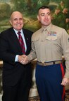 NEW YORK -- Marines from Special Purpose Marine Air Ground Task Force 26 pose with Rudy Giuliani, former New York City mayor and presidential candidate, during a Nov. 8 brunch at the Jumeriah Essex House in honor of the USS New York sailors and Special Purpose Marine Air Ground Task Force 26 Marines who embarked on the ship for her commissioning ceremony Nov. 11.