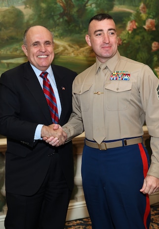 NEW YORK -- Marines from Special Purpose Marine Air Ground Task Force 26 pose with Rudy Giuliani, former New York City mayor and presidential candidate, during a Nov. 8 brunch at the Jumeriah Essex House in honor of the USS New York sailors and Special Purpose Marine Air Ground Task Force 26 Marines who embarked on the ship for her commissioning ceremony Nov. 11.