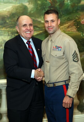 NEW YORK -- Marines from Special Purpose Marine Air Ground Task Force 26 pose with Rudy Giuliani, former New York City mayor and presidential candidate, during a Nov. 8 brunch at the Jumeriah Essex House in honor of the USS New York sailors and Special Purpose Marine Air Ground Task Force 26 Marines who embarked on the ship for her commissioning ceremony Nov. 11.