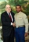 NEW YORK -- Marines from Special Purpose Marine Air Ground Task Force 26 pose with Rudy Giuliani, former New York City mayor and presidential candidate, during a Nov. 8 brunch at the Jumeriah Essex House in honor of the USS New York sailors and Special Purpose Marine Air Ground Task Force 26 Marines who embarked on the ship for her commissioning ceremony Nov. 11.