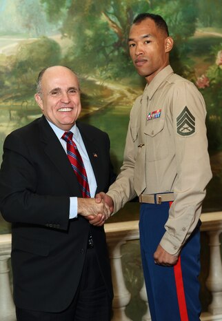 NEW YORK -- Marines from Special Purpose Marine Air Ground Task Force 26 pose with Rudy Giuliani, former New York City mayor and presidential candidate, during a Nov. 8 brunch at the Jumeriah Essex House in honor of the USS New York sailors and Special Purpose Marine Air Ground Task Force 26 Marines who embarked on the ship for her commissioning ceremony Nov. 11.