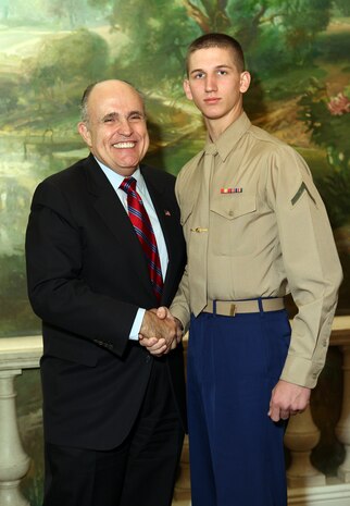 NEW YORK -- Marines from Special Purpose Marine Air Ground Task Force 26 pose with Rudy Giuliani, former New York City mayor and presidential candidate, during a Nov. 8 brunch at the Jumeriah Essex House in honor of the USS New York sailors and Special Purpose Marine Air Ground Task Force 26 Marines who embarked on the ship for her commissioning ceremony Nov. 11.