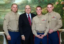 NEW YORK -- Marines from Special Purpose Marine Air Ground Task Force 26 pose with Rudy Giuliani, former New York City mayor and presidential candidate, during a Nov. 8 brunch at the Jumeriah Essex House in honor of the USS New York sailors and Special Purpose Marine Air Ground Task Force 26 Marines who embarked on the ship for her commissioning ceremony Nov. 11.