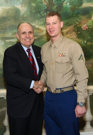 NEW YORK -- Marines from Special Purpose Marine Air Ground Task Force 26 pose with Rudy Giuliani, former New York City mayor and presidential candidate, during a Nov. 8 brunch at the Jumeriah Essex House in honor of the USS New York sailors and Special Purpose Marine Air Ground Task Force 26 Marines who embarked on the ship for her commissioning ceremony Nov. 11.