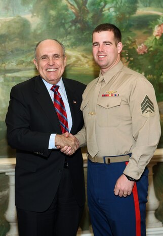 NEW YORK -- Marines from Special Purpose Marine Air Ground Task Force 26 pose with Rudy Giuliani, former New York City mayor and presidential candidate, during a Nov. 8 brunch at the Jumeriah Essex House in honor of the USS New York sailors and Special Purpose Marine Air Ground Task Force 26 Marines who embarked on the ship for her commissioning ceremony Nov. 11.