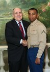 NEW YORK -- Marines from Special Purpose Marine Air Ground Task Force 26 pose with Rudy Giuliani, former New York City mayor and presidential candidate, during a Nov. 8 brunch at the Jumeriah Essex House in honor of the USS New York sailors and Special Purpose Marine Air Ground Task Force 26 Marines who embarked on the ship for her commissioning ceremony Nov. 11.