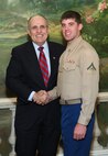 NEW YORK -- Marines from Special Purpose Marine Air Ground Task Force 26 pose with Rudy Giuliani, former New York City mayor and presidential candidate, during a Nov. 8 brunch at the Jumeriah Essex House in honor of the USS New York sailors and Special Purpose Marine Air Ground Task Force 26 Marines who embarked on the ship for her commissioning ceremony Nov. 11.