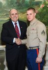 NEW YORK -- Marines from Special Purpose Marine Air Ground Task Force 26 pose with Rudy Giuliani, former New York City mayor and presidential candidate, during a Nov. 8 brunch at the Jumeriah Essex House in honor of the USS New York sailors and Special Purpose Marine Air Ground Task Force 26 Marines who embarked on the ship for her commissioning ceremony Nov. 11.