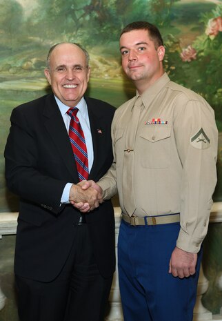 NEW YORK -- Marines from Special Purpose Marine Air Ground Task Force 26 pose with Rudy Giuliani, former New York City mayor and presidential candidate, during a Nov. 8 brunch at the Jumeriah Essex House in honor of the USS New York sailors and Special Purpose Marine Air Ground Task Force 26 Marines who embarked on the ship for her commissioning ceremony Nov. 11.