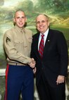 NEW YORK -- Marines from Special Purpose Marine Air Ground Task Force 26 pose with Rudy Giuliani, former New York City mayor and presidential candidate, during a Nov. 8 brunch at the Jumeriah Essex House in honor of the USS New York sailors and Special Purpose Marine Air Ground Task Force 26 Marines who embarked on the ship for her commissioning ceremony Nov. 11.