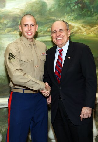 NEW YORK -- Marines from Special Purpose Marine Air Ground Task Force 26 pose with Rudy Giuliani, former New York City mayor and presidential candidate, during a Nov. 8 brunch at the Jumeriah Essex House in honor of the USS New York sailors and Special Purpose Marine Air Ground Task Force 26 Marines who embarked on the ship for her commissioning ceremony Nov. 11.
