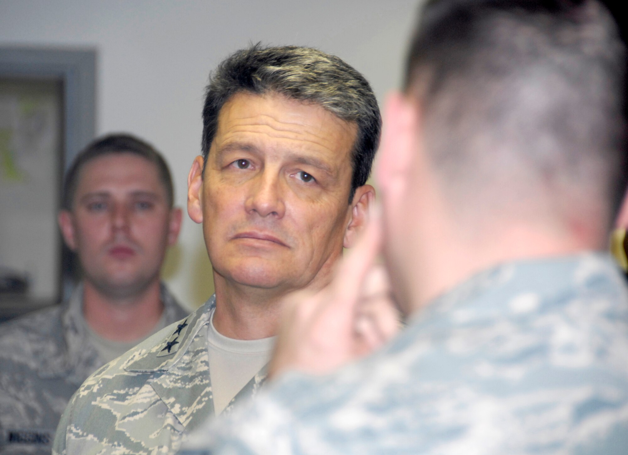 Maj. Gen. Frank Padilla listens to a question posed by Chief Master Sgt. Ralph Loar, chief of the the 442nd Civil Engineer Squadron's Fire-Protection Flight, Nov. 8, at Whiteman Air Force Base, Mo.  General Padilla is the commander of Air Force Reserve Command's 10th Air Force, the parent command of the 442nd Fighter Wing, based at Whiteman.  The general visited the 442nd Fighter Wing Nov. 6 to 8 during the wing's unit-training-assembly weekend.  (U.S. Air Force photo/Maj. David Kurle)