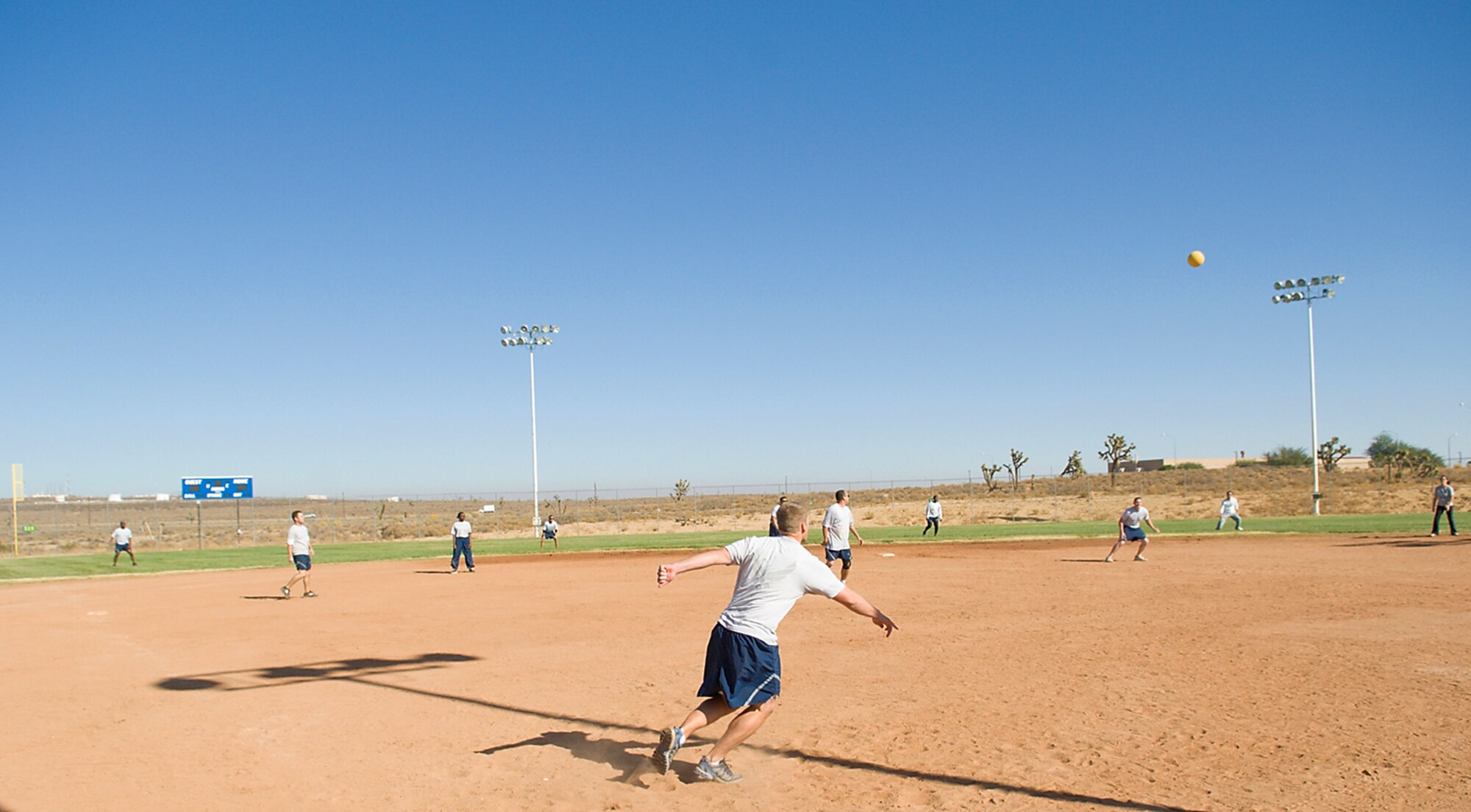 Staff Sgt. Kenneth Daniel (center), 412th Maintenance Squadron maintainer, plays kickball at the Rosburg Fitness Center during Wingman Day Nov. 6. Wingman Day was held as part of the Year of the Air Force Family Initiative. (Air Force photo/Mike Cassidy)