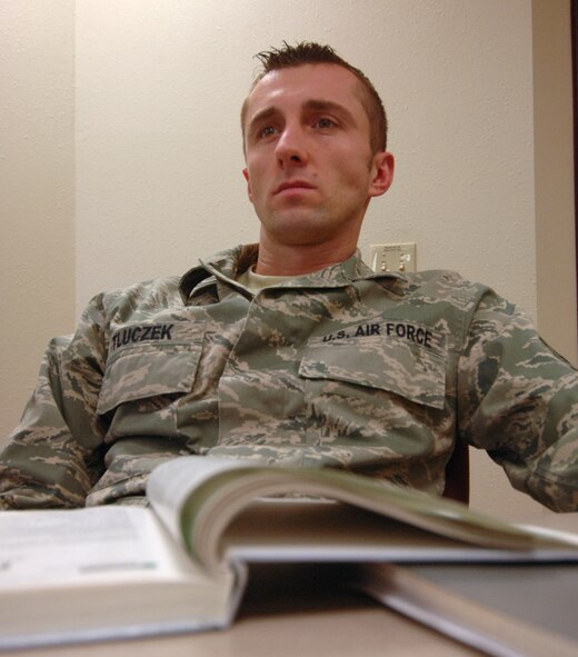 Staff Sgt. Pawel C. Tluczek, 319th Logistics Readiness Squadron, listens to a lecture Nov. 9 at the Grand Forks Air Force Base Education Center. For more information on educational benefits and opportunities, call (701) 747-3316. (U.S. Air Force photo by Senior Airman R. Michael Longoria)