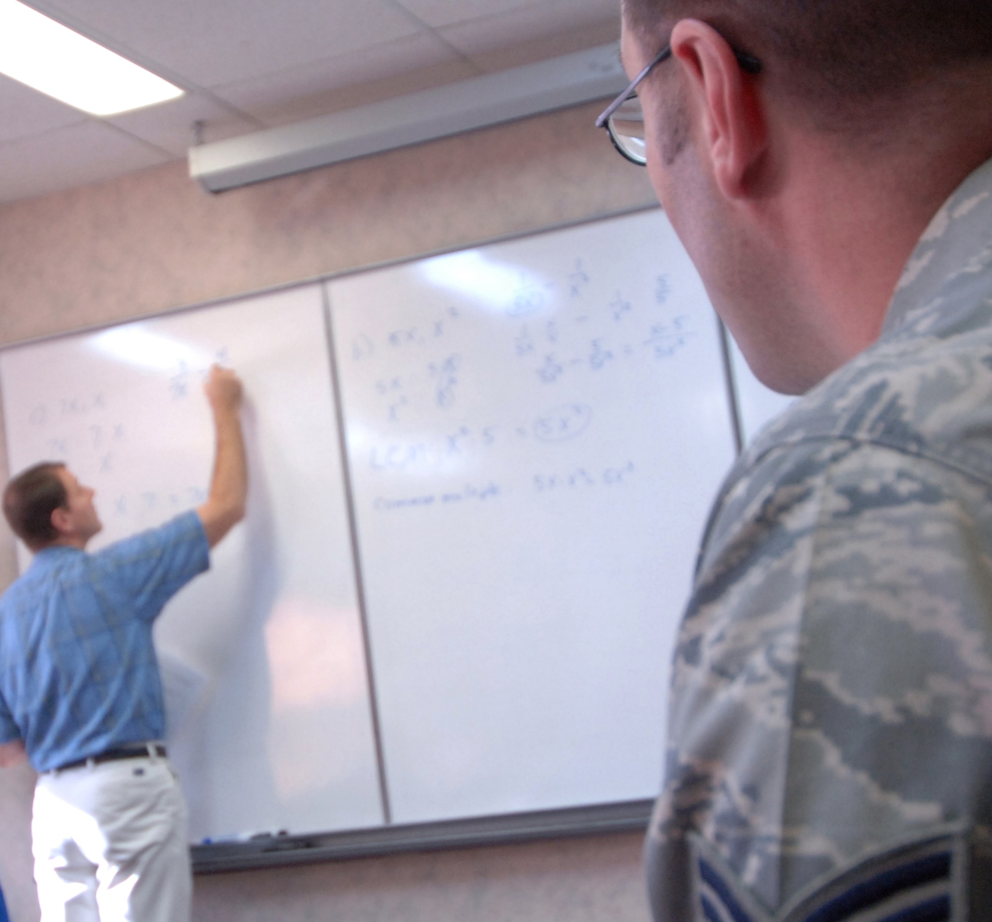 Tech. Sgt. Wayne M. Birk, 319th Aircraft Maintenance Squadron, takes notes during a math class Nov. 9 at the Grand Forks Air Force Base Education Center. For more information on educational benefits and opportunities, call (701) 747-3316. (U.S. Air Force photo by Senior Airman R. Michael Longoria)