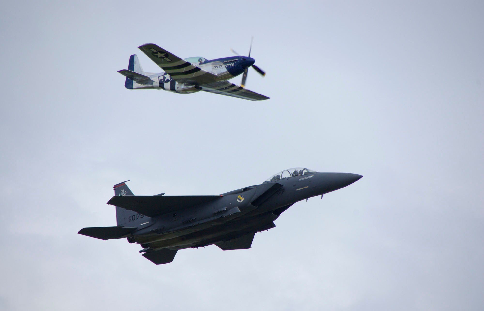 An F-15 Eagle performs a "Legacy Flight" with a P-51 Mustang during the Wings Over Homestead Air Show on Nov. 7-8. (U.S. Air Force photo/Mr. Albert Seigel)