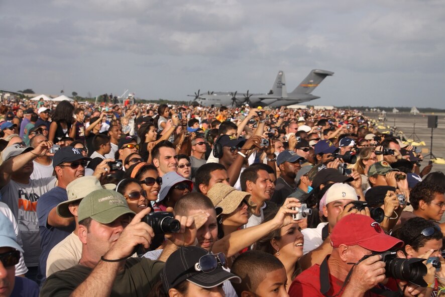 Guests of the Wings Over Homestead Air Show gathered by the fenceline to photograph the U.S. Air Force Thunderbirds (U.S. Air Force photo/Tech Sgt. Lionel Castellano)