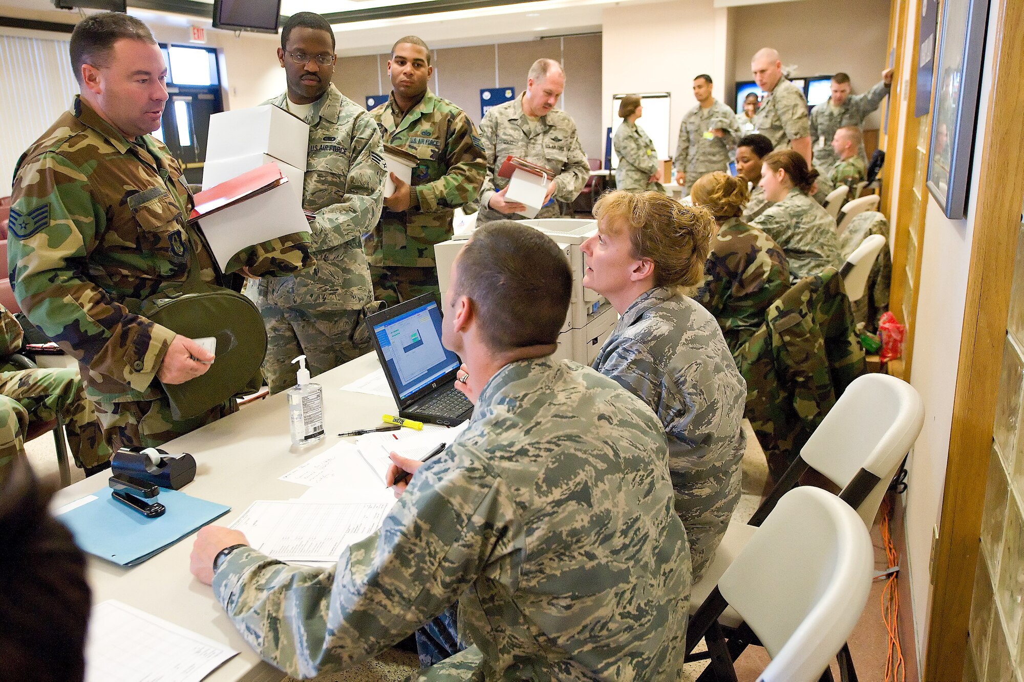 More than 140 reservists assigned to the 512th Airlift Wing participated in a deployment exercise Nov. 7 during the Unit Training Assembly. The purpose of the exercise is to practice mobility processes and ensure wing readiness. (U.S. Air Force photo/Roland Balik)
