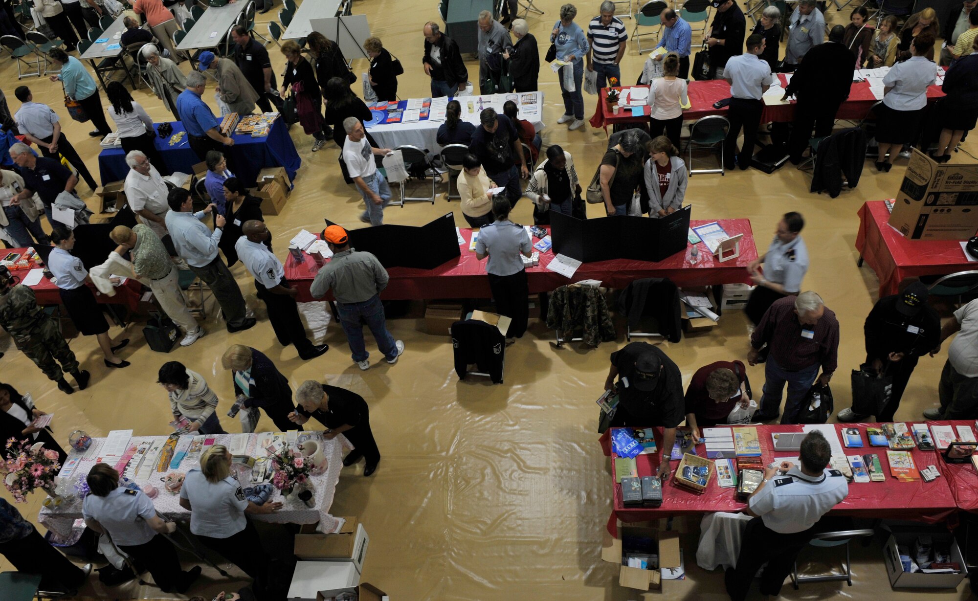MOODY AIR FORCE BASE, Ga. -- Retirees and their families take advantage of information about their benefits during the Retiree Appreciation Day event here Nov. 7. The day featured briefings, a health and information fair and a flag-folding ceremony by the base Honor Guard. (U.S. Air Force photo by Senior Airman Schelli Jones)