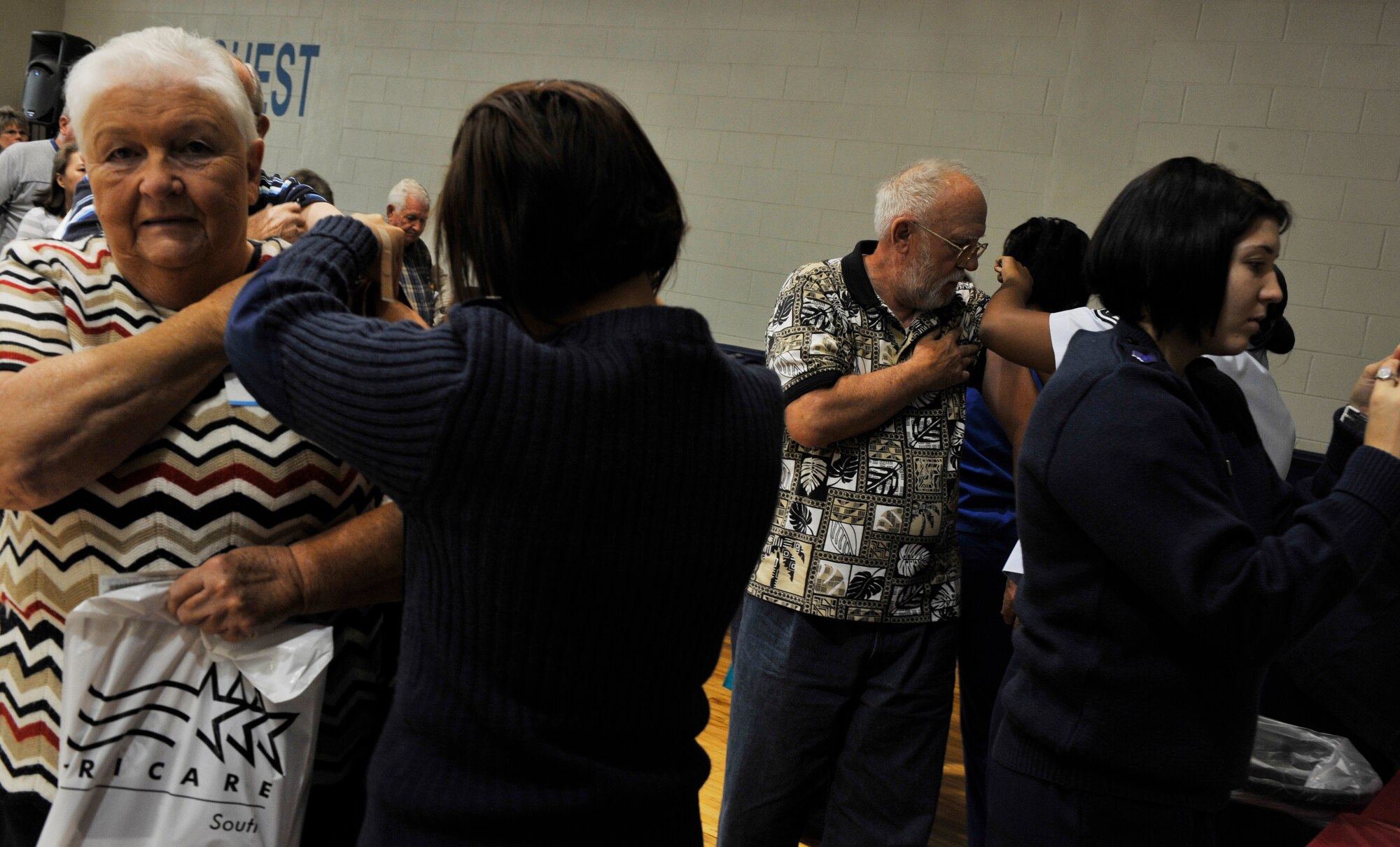 MOODY AIR FORCE BASE, Ga. -- Members of the 23rd Medical Group administer flu shots during the Retiree Appreciation event held here Nov 7. This annual week-long event is set aside to recognize retirees and let them know their service is still appreciated. (U.S. Air Force photo by Senior Airman Schelli Jones)