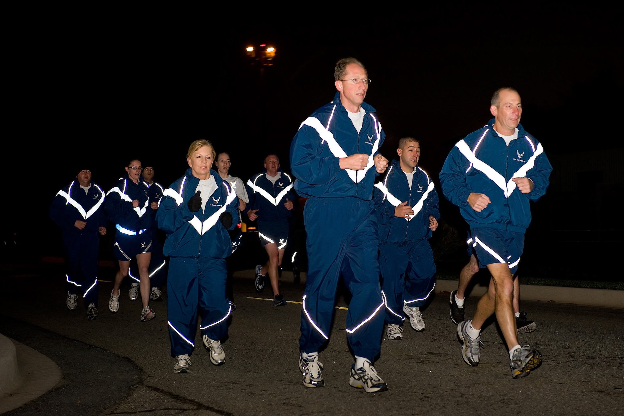 Maj. Gen. James T. Rubeor, 22nd Air Force commander, runs with 512th Airlift Wing reservists Nov. 8. The general visited Dover Air Force Base, Del., Nov. 5-8. The 512th AW is a subordinate of 22nd AF. As the commander of 22 AF, General Rubeor, manages 15 AF Reserve wings located in 14 states with more than 25,000 reservists and 149 unit-equipped aircraft. (U.S. Air Force photo/Roland Balik)