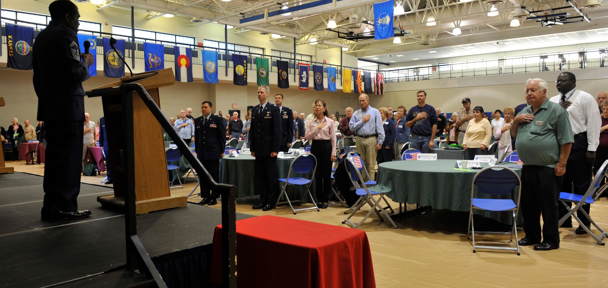 MOODY AIR FORCE BASE, Ga. -- Retired Chief Master Sgt. Jimmy Ingram, 23rd Wing retiree affairs office director, sings the national anthem here Nov 7.  "It's really gratifying to give back to the men and women who gave so much to the Air Force," said Mr. Ingram. (U.S. Air Force photo by Senior Airman Schelli Jones)