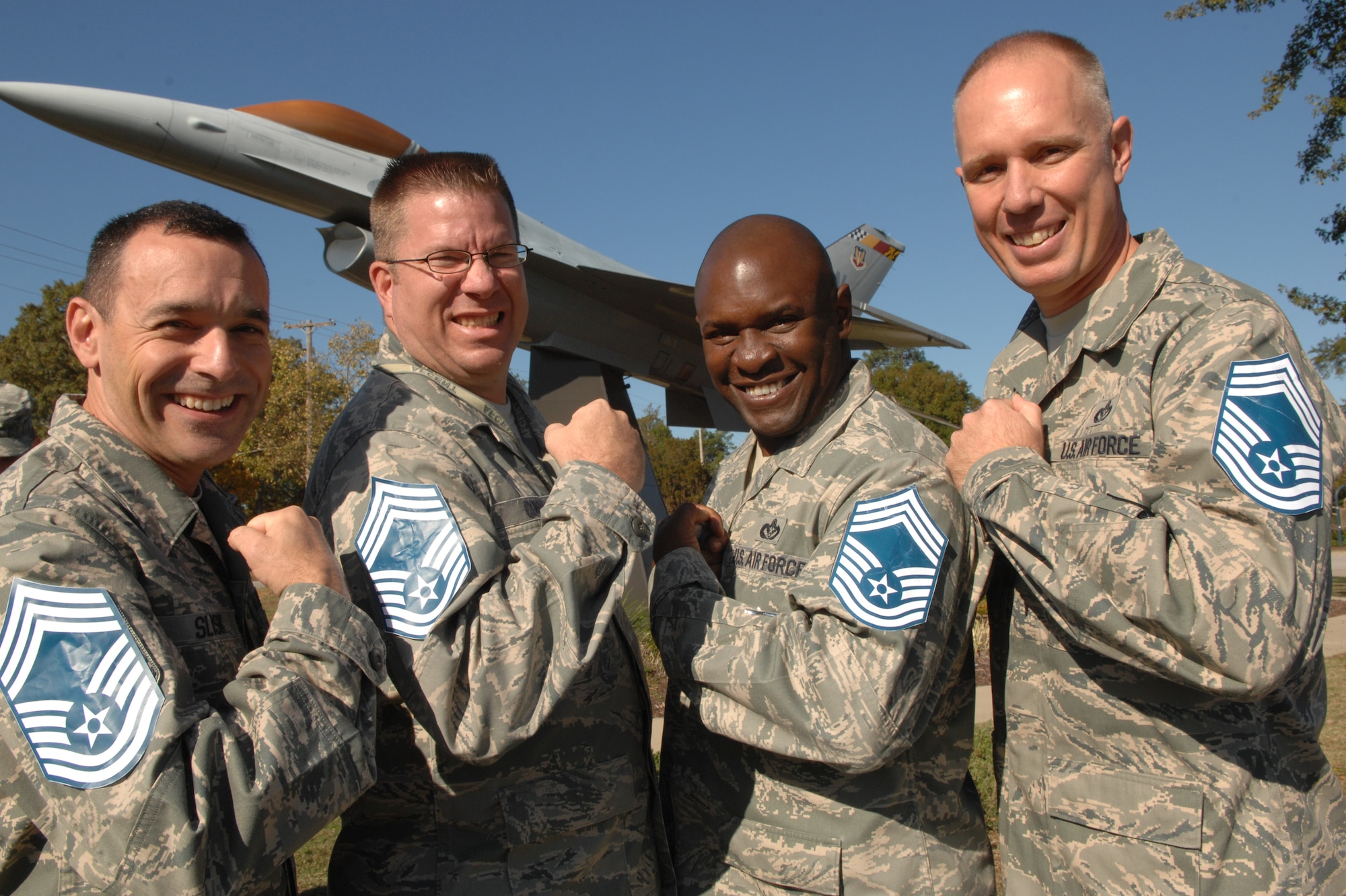 SHAW AIR FORCE BASE, S.C. -- (l-r) Senior Master Sgts. James Slisik, Cullen Combs, Bruce Smalls and James Bomboy sport paper stripes after being notified of their selection for promotion, Nov. 5. Not shown are Senior Master Sgts. Baird Steifel, who has left due to a permanent change of station, and Robert Havermann, who is currently deployed. (U.S. Air Force photo / Senior Airman Kathrine McDowell) 