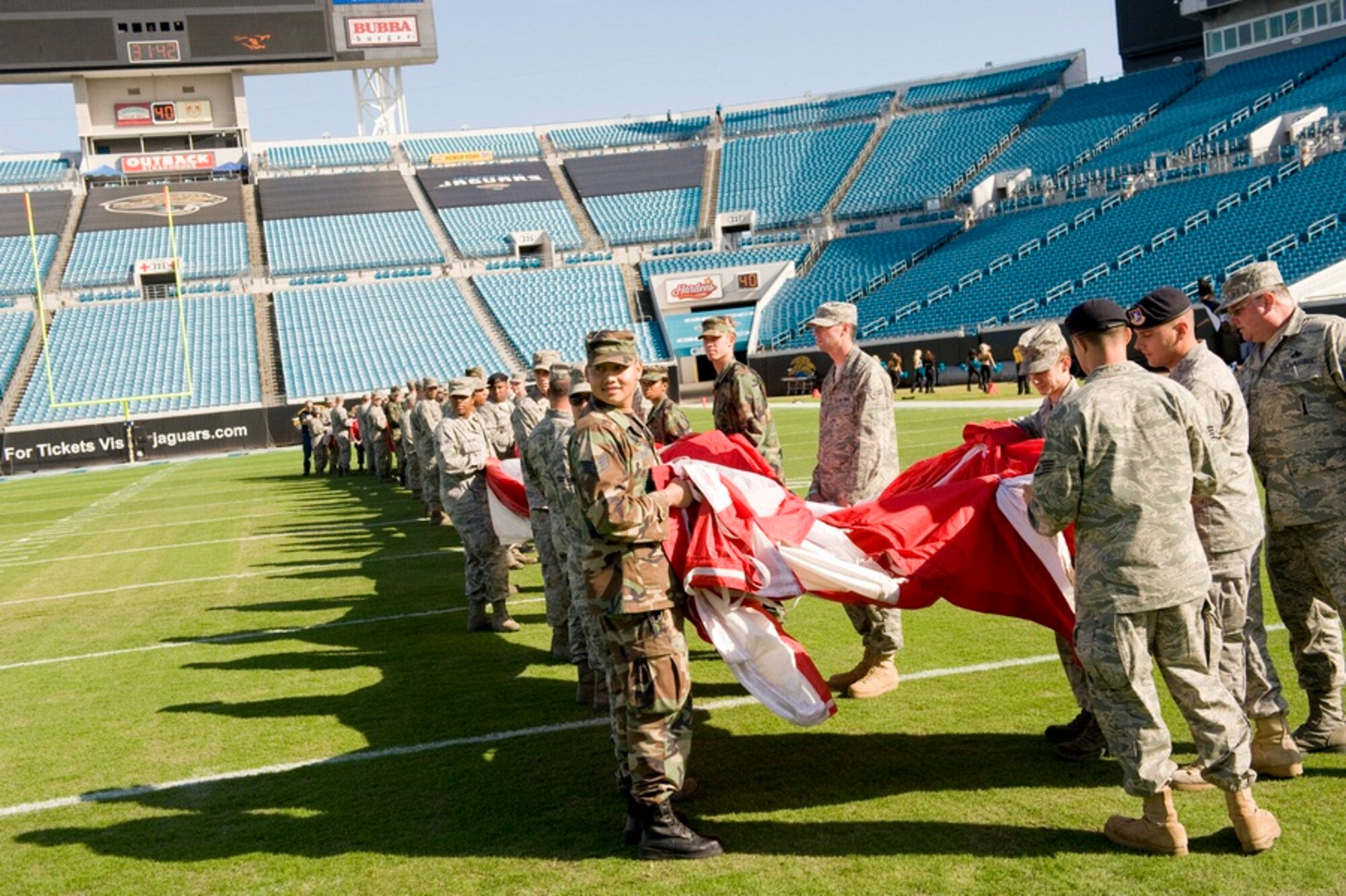 Tyndall Airmen practice unfurling the American flag for Military Appreciation Day at the Jacksonville Jaguars versus Kansas City Chiefs game in the Jacksonville Municipal Stadium Nov. 8. (U.S. Air Force photo by Jonathan Gibson)