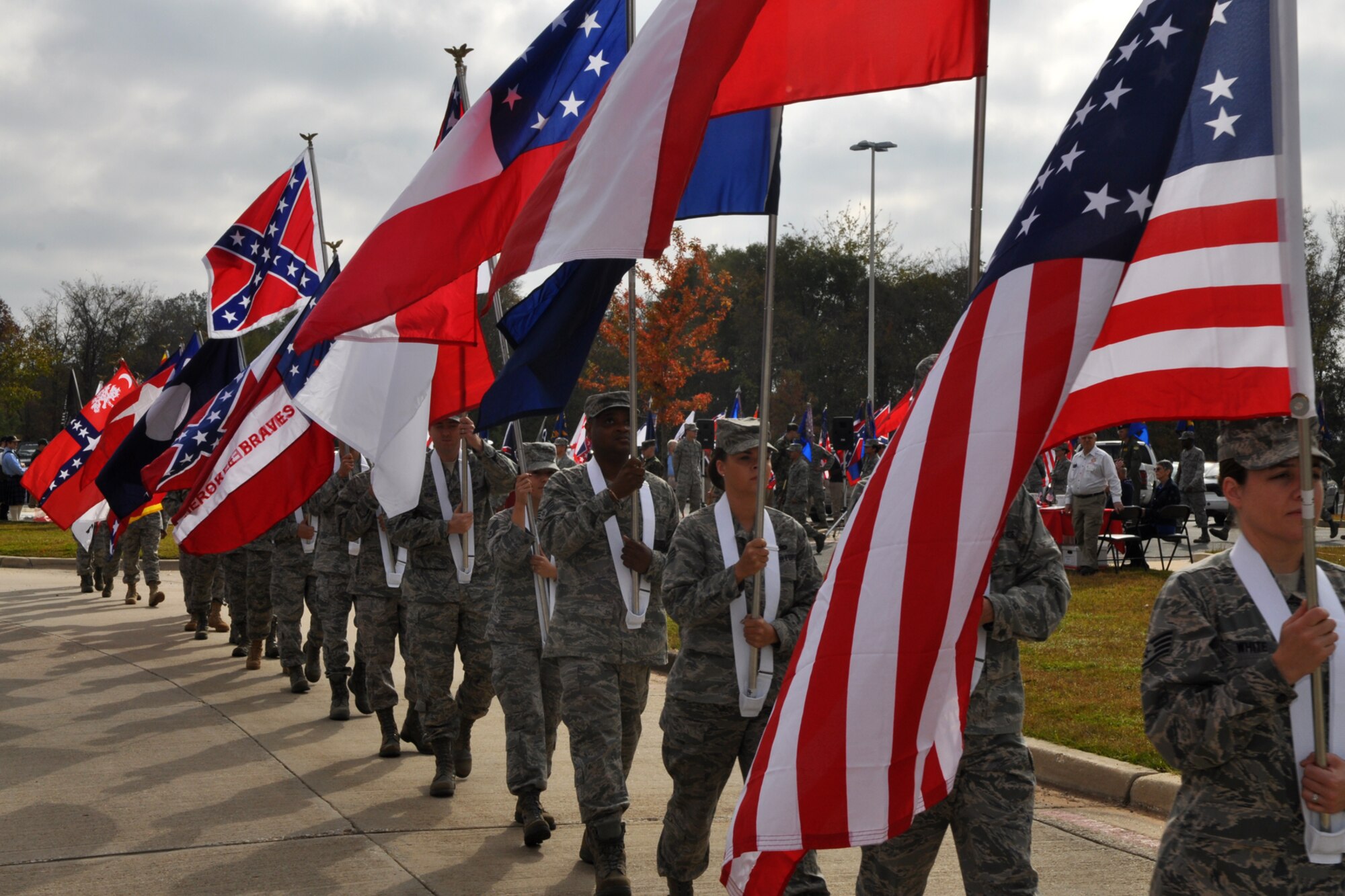 Airmen from Barksdale Air Force Base, La., assist in carrying all the flags that have flown over America from the Revolutionary War to present day. Hundreds of Airmen from Barksdale participated in and attended the parade, which celebrated America’s veterans. A B-52 Stratofortress from the 93rd Bomb Squadron amazed the crowd with a flyover during the parade. (U.S. Air Force photo/Tech. Sgt. Jeff Walston)