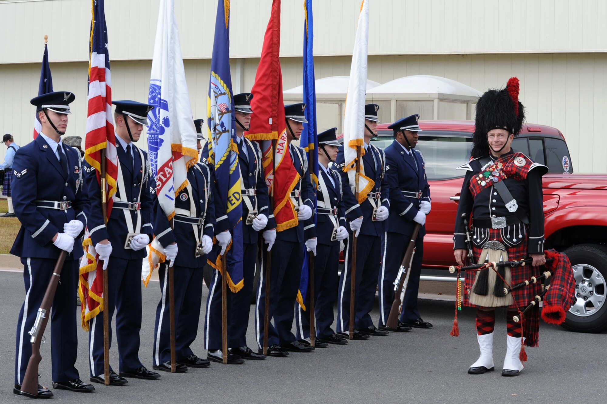 Bagpiper Vernon Love prepares to lead off the Veteran’s Day Parade at the Bossier Parish Community College campus with members of the Barksdale Air Force Base Honor Guard November 7, 2009. This is Mr. Love’s 70th event this year. Hundreds of Airmen from Barksdale AFB, La., participated in and attended the parade, which celebrated America’s veterans. A B-52 Stratofortress from the 93rd Bomb Squadron amazed the crowd with a flyover during the parade. (U.S. Air Force photo/Tech. Sgt. Jeff Walston)